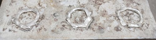 Judy Larson's Ribbon Wrapped Bracelet tips - , Wire Jewelry Design, Design,  circular shapes light gray, mottled surface.